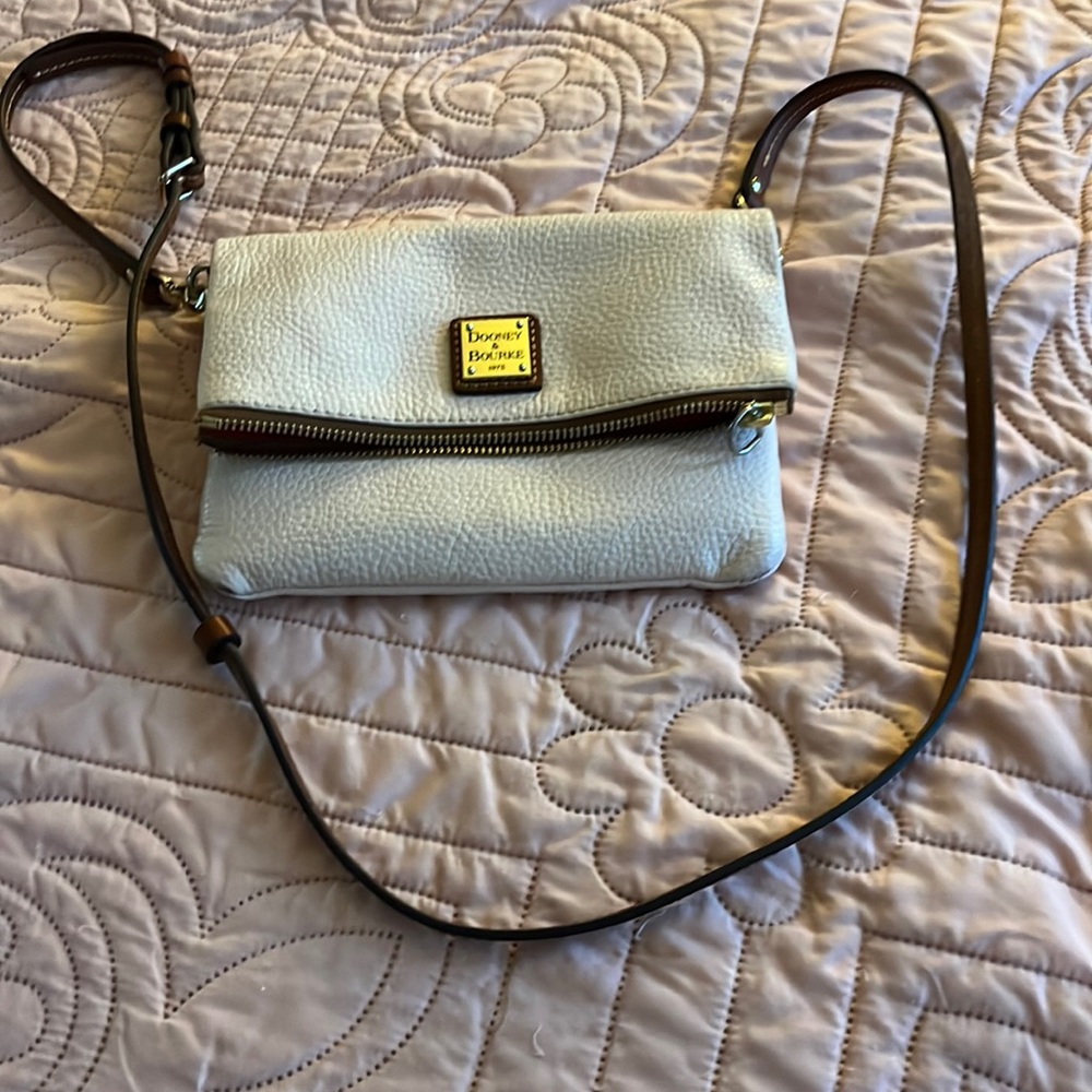Dooney Bourke purse.  Crossover pink. In good condition used very little.